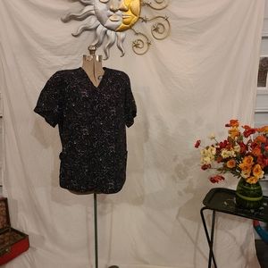 Lot of 5 scrub tops. Size large.